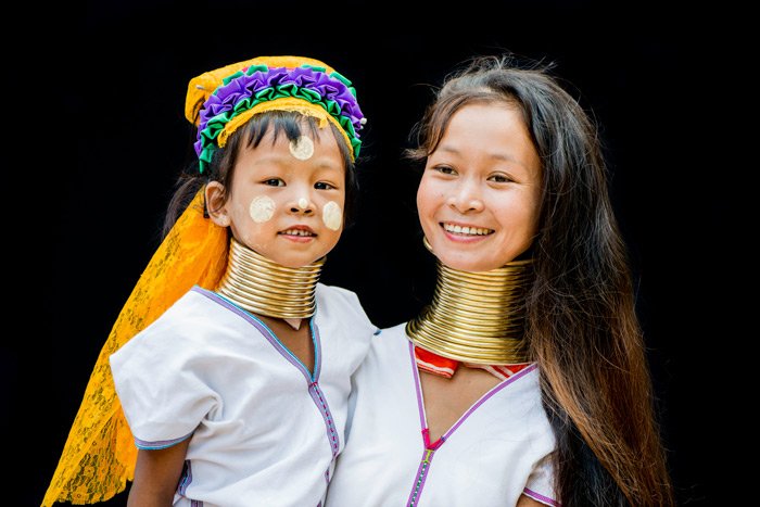 Long neck Kayan mother and daughter portrait in outdoor studio made during a custom Chiang Mai Photo Workhsop