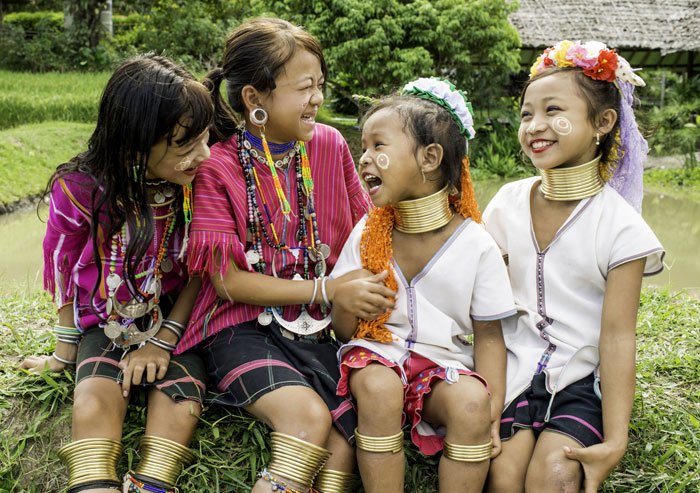 Kayan long neck and Kayaw girls laughing together