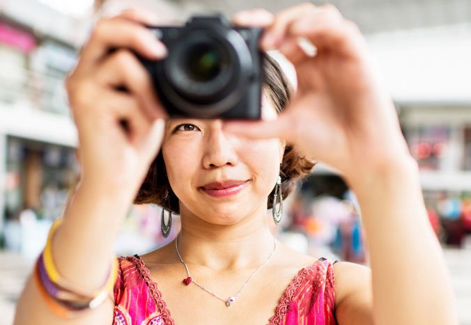 Woman Photographer at the Shopping Mall