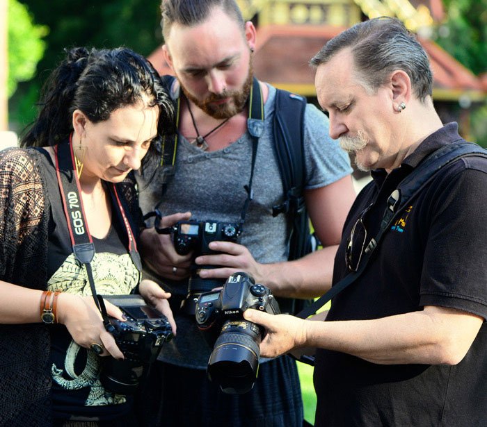 THree people with DSLR cameras Photographer Mentoring with Kevin Landwer-Johan