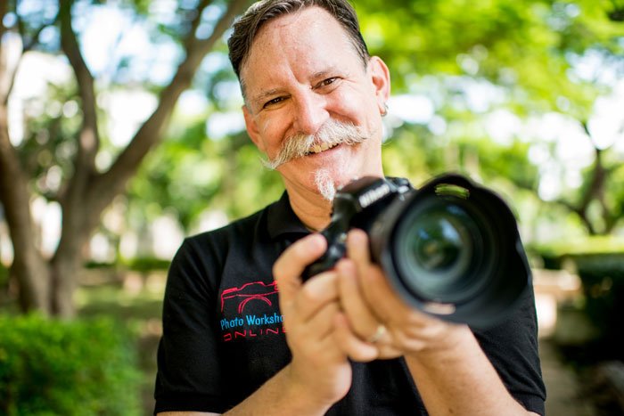 Kevin Landwer-Johan with DSLR Camera - Why I Believe Using Manual Mode Is The Best Option