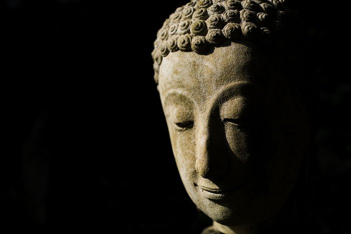 Buddha statue head high contrast about the best exposure choice