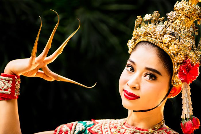 Thai Model with Extended Fingers for an article about making the best exposure choice