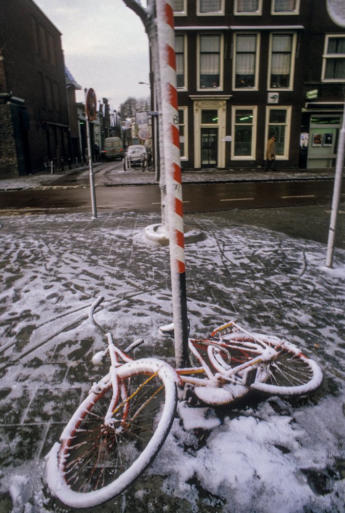 Bicycle on ground covered with snow in how to photograph people
