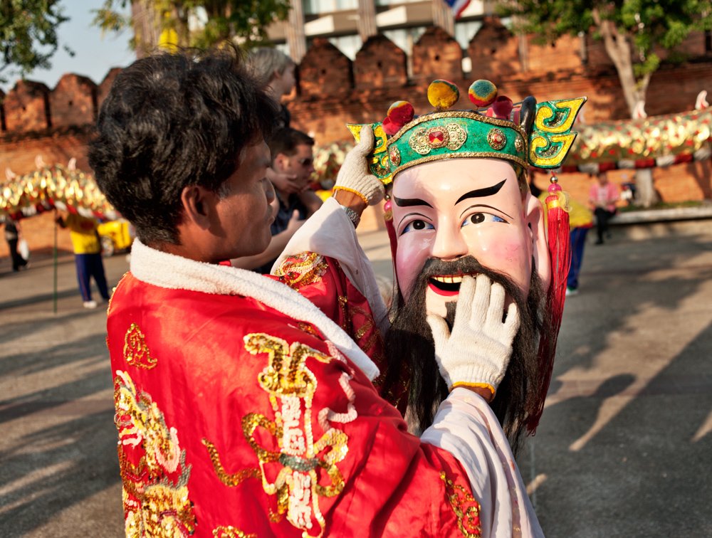 25 Valuable Tips For The Best Travel Photography Portraits Chinese New Year Mask