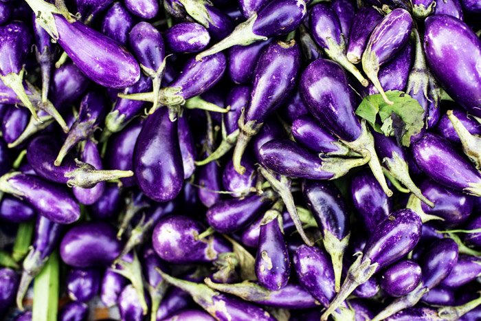 Close up of Egg Plant being sold at Muang Mai Market in Chiang Mai, Thailand. how to tell stories with photos