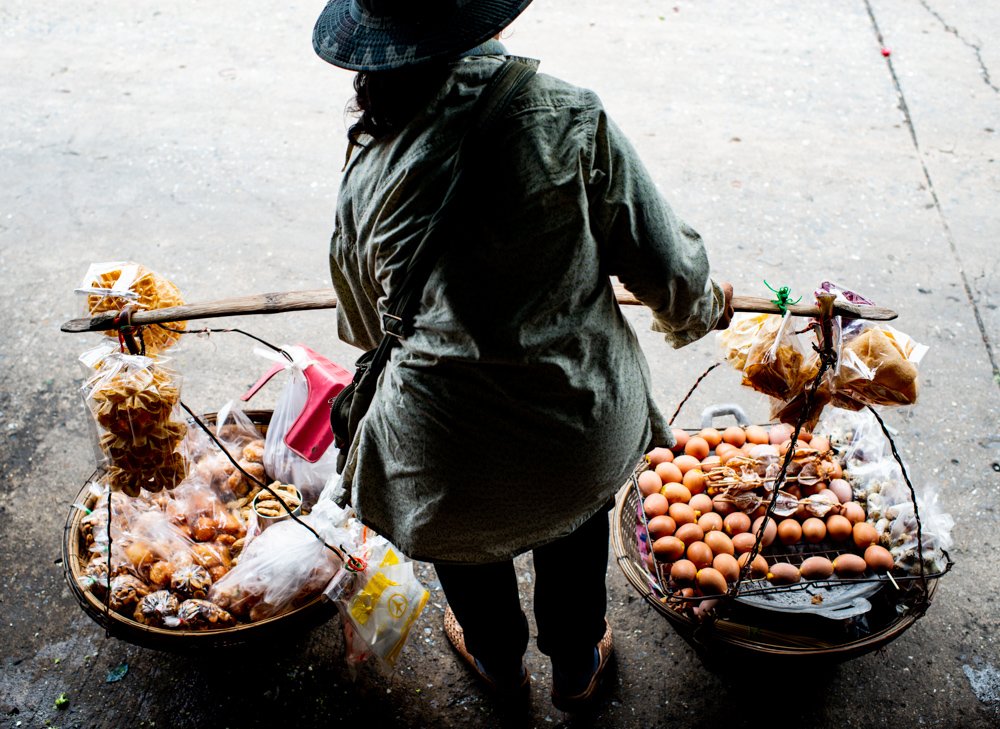 Woman selling eggs at Muang Mai Market, Chiang Mai, Thailand.