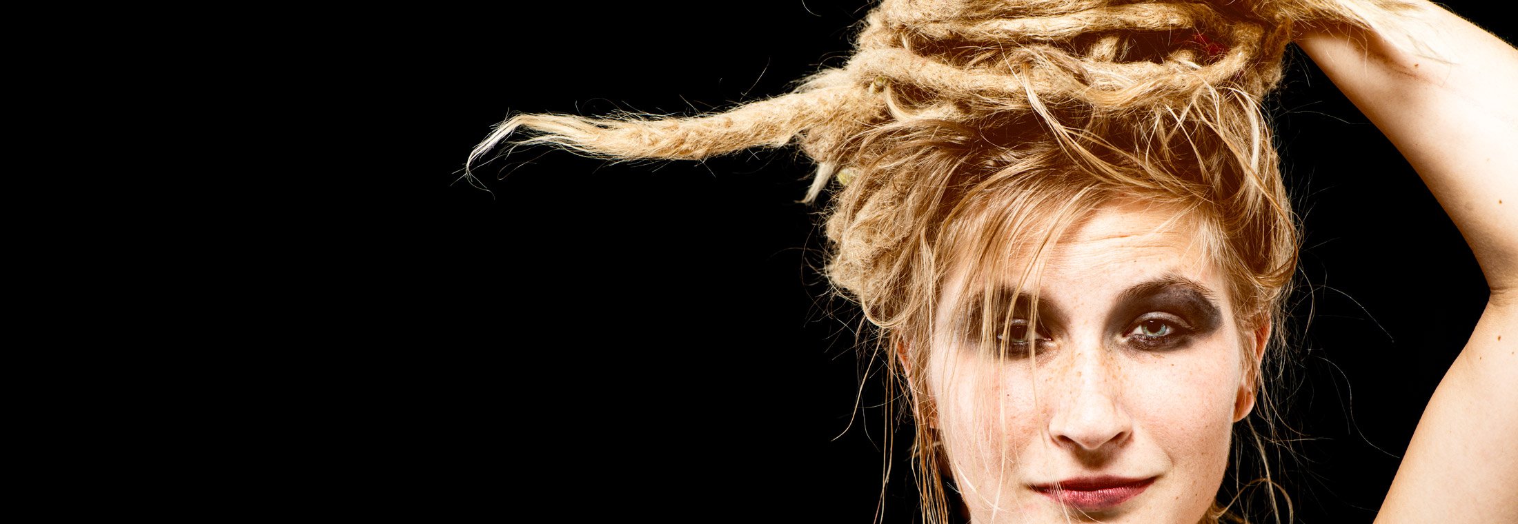 portrait of a woman with dreadlocks