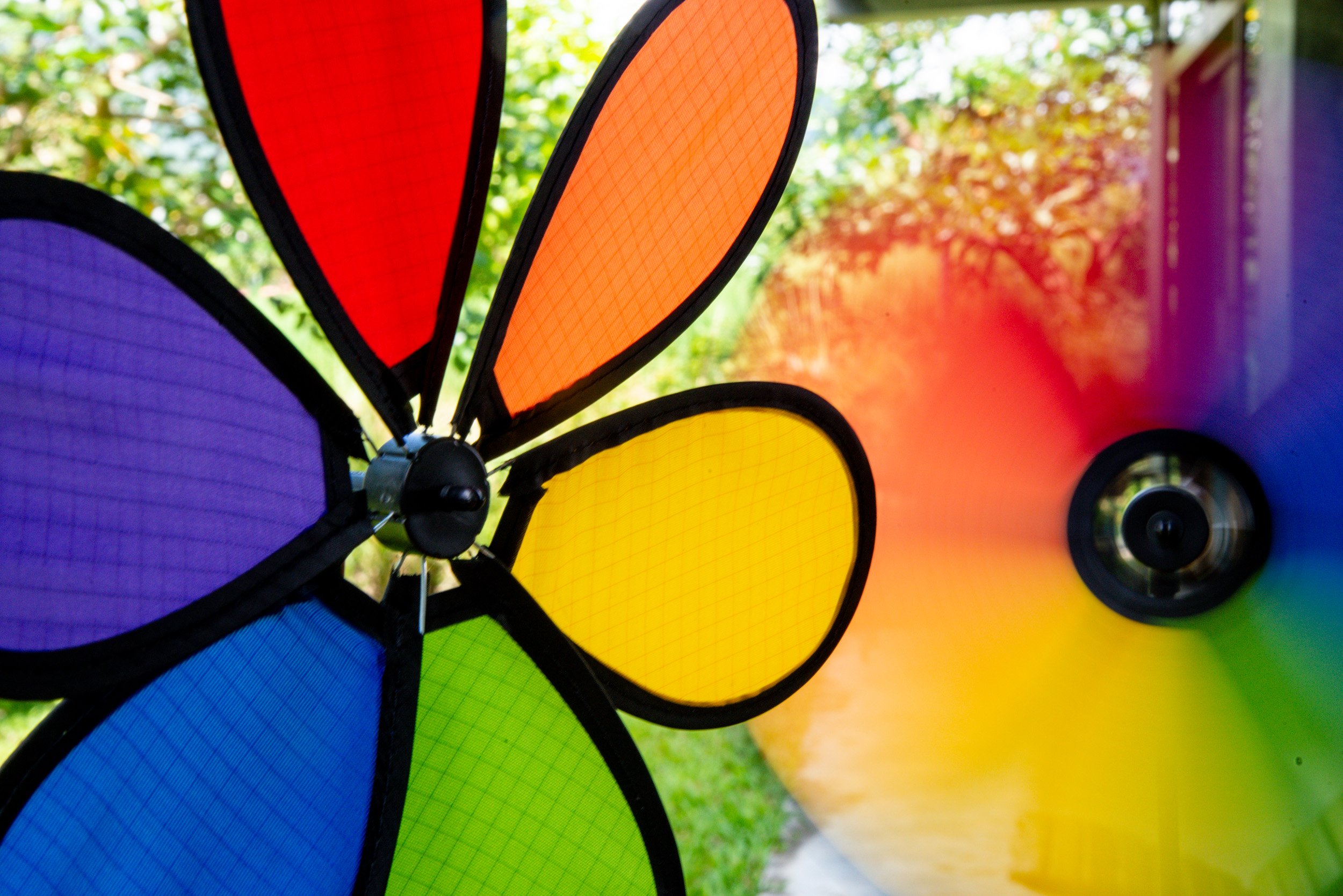 flower spinners with one blurry